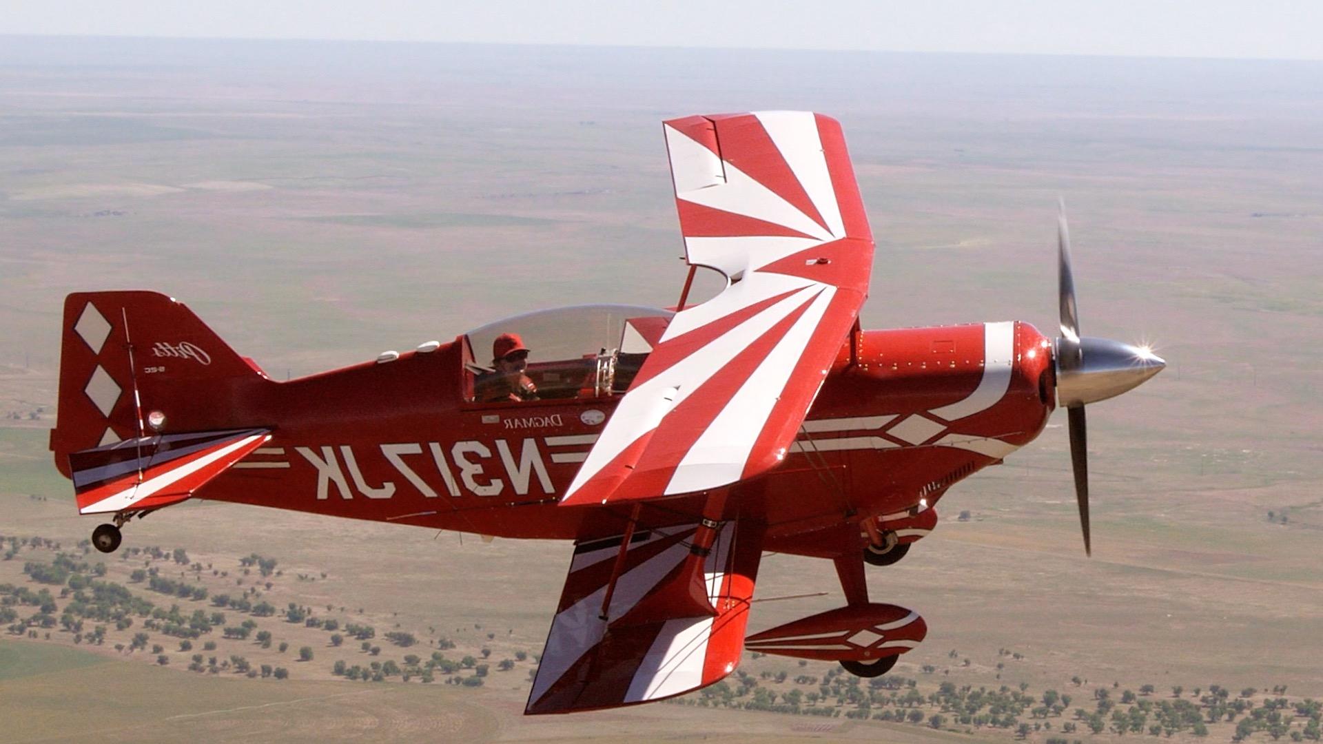 Aerobatics plane soaring.